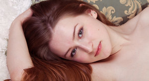 18 year old female boxer Sabrina Blond covers up her naked tits